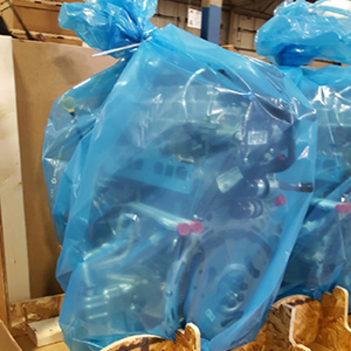 Cortec VpCI rust inhibiting bag around an engine component